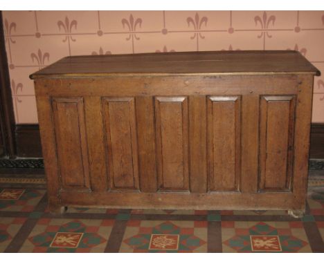 LATE 18TH CENTURY OAK DOWER CHEST having a four panel lid over a base having five narrow fielded front panels, 86cms H, 156cm