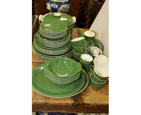 Poole green glazed service, over fifty pieces