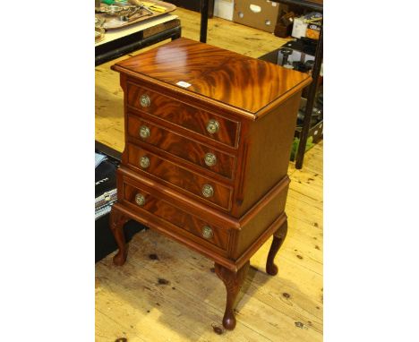 Mahogany four drawer pedestal chest on cabriole legs