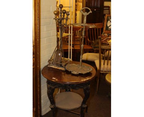 Circular cast base pub table, brass umbrella stand, brass fender and fire tools