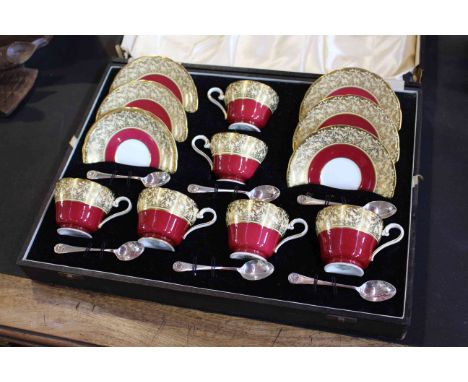 Boxed Aynsley coffee cups and saucers with silver spoons