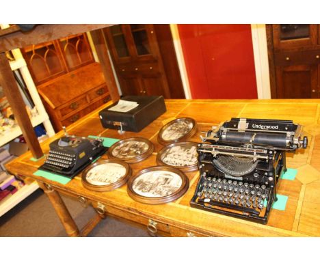 Two vintage Imperial and Underwood typewriters and set of five oval photographs