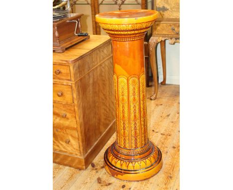 Late Victorian jardiniere stand in treacle glaze, of Linthorpe style of pottery