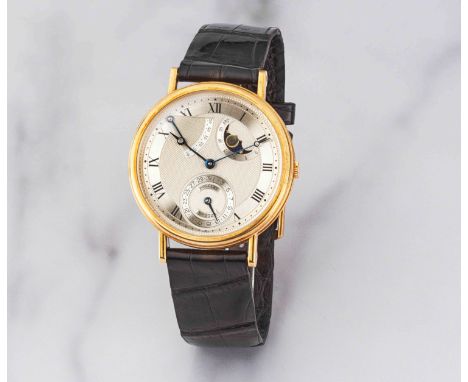 Breguet. Montre bracelet en or jaune 18K (750) avec date, phase de lune et réserve de marche mouvement automatiqueBreguet. An