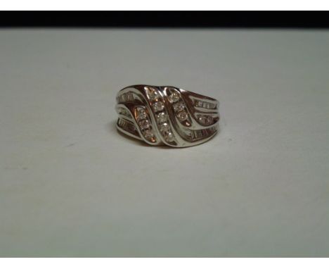 Diamond ring set with round and baguette diamonds, set 9ct white gold, size K, Condtion report: Excellent condition