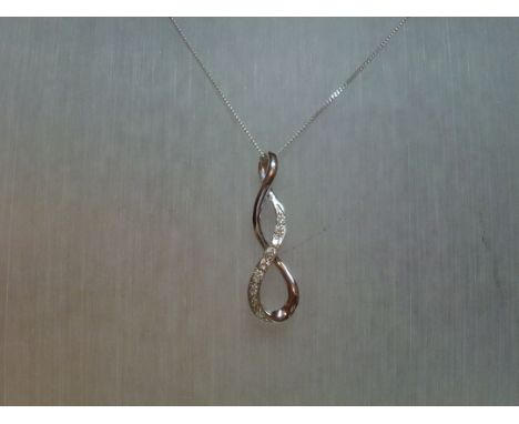 Diamond Twist pendant &amp; chain, set 9ct white gold. Condition report: used item, excellent condition