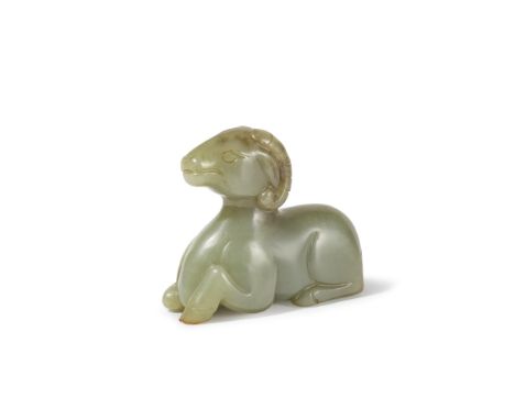 BÉLIER EN JADE CÉLADON SCULPTÉA CELADON JADE FIGURE OF A RAMCarved in the round in a recumbent position, with legs tucked und