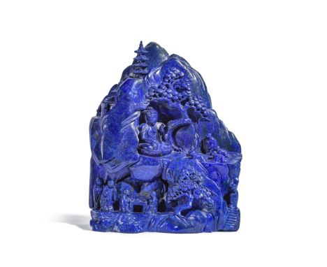 GRAND ROCHER EN LAPIS LAZULI SCULPTÉXXe siècleA LAPIS LAZULI BOULDER20th centuryBoldly carved on one side with the image of B
