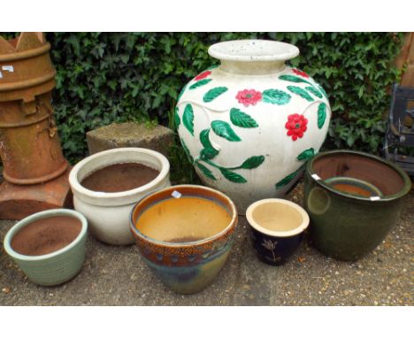 Six assorted ceramic and other garden pots and one very large garden pot 
