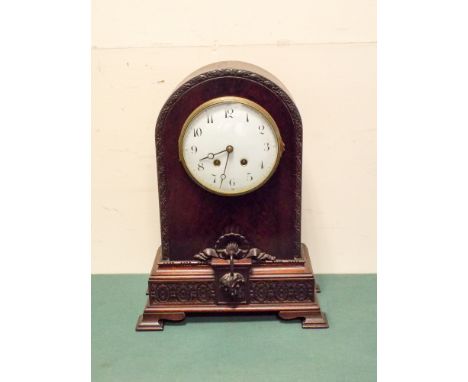 A Victorian striking bracket clock in mahogany case with white enamel dial 18" tall