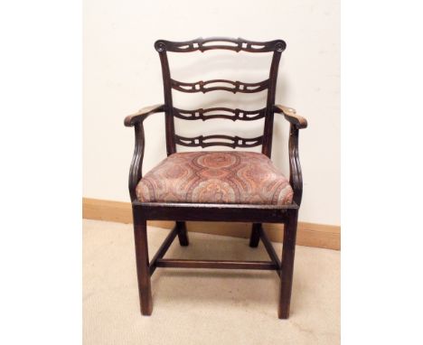 A Georgian style mahogany ladder back style elbow chair with upholstered seat  