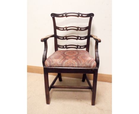 A Georgian style mahogany ladder back style elbow chair with upholstered seat  