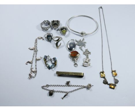 A collection of silver jewellery to include dress rings and a  money clip and other jewellery to include vintage marcasite ne