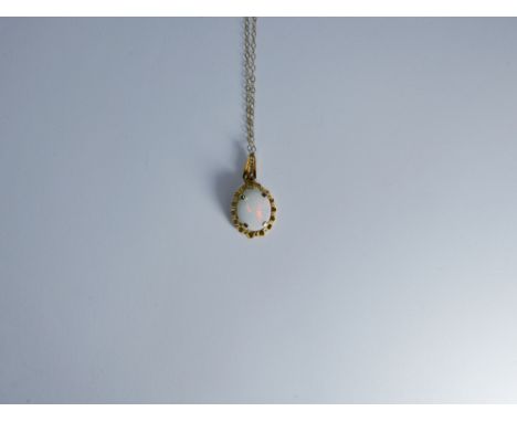 Opal pendant necklace on 9ct gold chain