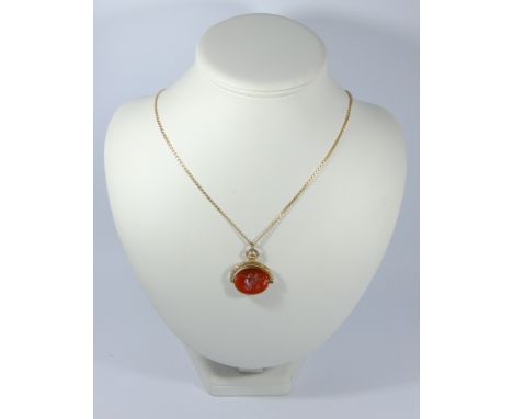 Oval intaglio carved swivel fob, carved with a ladies head to one side on 9ct yellow gold chain, gross weight 13.5 grams.