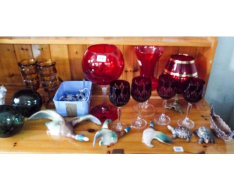 A quantity of assorted ruby glass, wall birds, figure ornaments etc