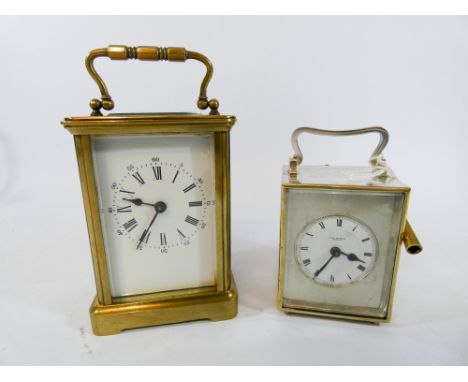 A silver plated square cased carriage clock by John Russell London , together with a gilt brass carriage clock, silver plated