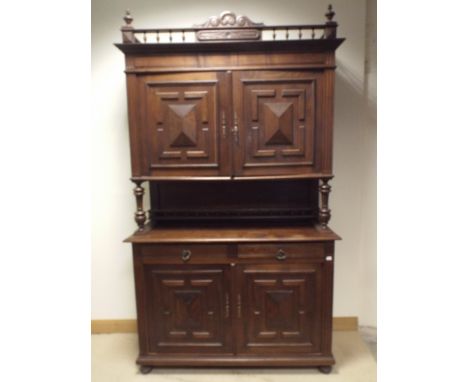 A French walnut buffet cabinet with top fielded panel cupboard, drawers and cupboards under, 56" wide x 95" high 