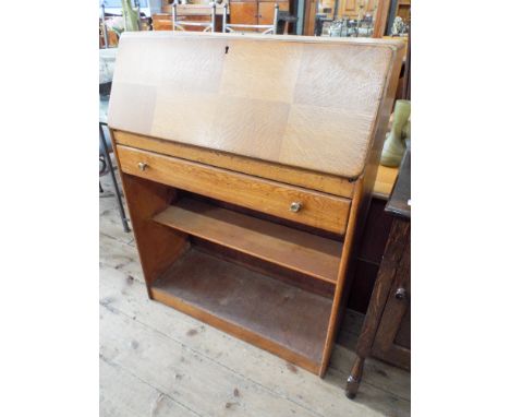 A 2'6 light oak bureau fitted drawer and shelf under 