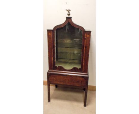 An antique inlaid mahogany display cabinet with shaped Gothic style door standing on table style base, 27" wide x 18" deep x 