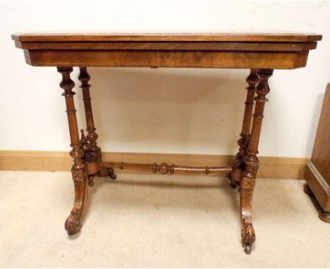 Victorian inlaid walnut folding top card table on a stretcher style base, 3'0 wide 