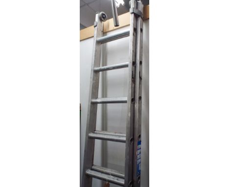 A small 18 rung aluminium extending ladder 