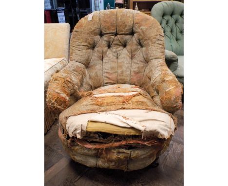 A Victorian upholstered button back Easy Chair which needs re-upholstery 
