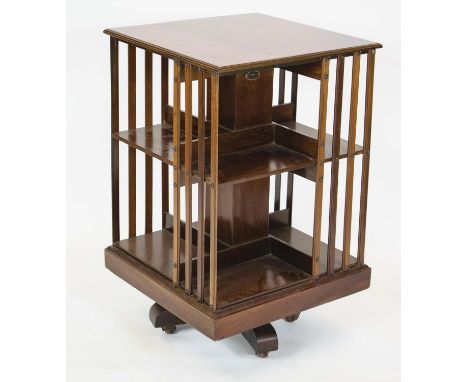 MAPLE &amp; CO REVOLVING BOOKCASE, 80cm H x 49cm W, Edwardian mahogany on ceramic castors, labelled. 