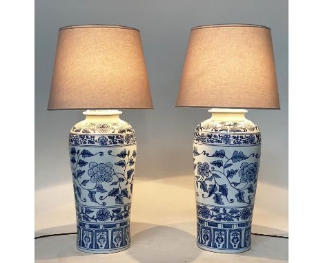 TABLE LAMPS, a pairs, Chinese blue and white ceramic of lidded vase form, with shades, 75cm H. (2) 