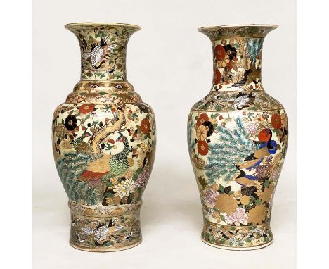 TEMPLE JARS, two, early 20th century Chinese ceramic gilded and polychrome decorated depicting peacocks and herons, 82cm H. (