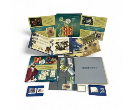 A collection of six proof sets of German and Dutch stamps and coins, contained in display cards. (6)Condition: Various condit