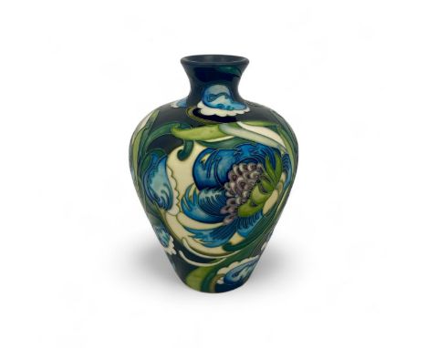 A Moorcroft baluster vase designed by Emma Bossons in 2008 with an unusual and appealing pattern in the style of William De M