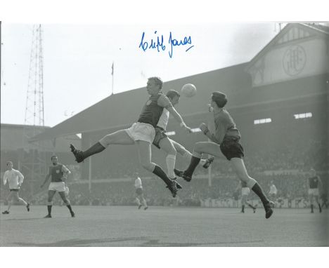 CLIFF JONES 1967, football autographed 12 x 8 photo, a superb image depicting the Tottenham winger in an aerial dual with Wes