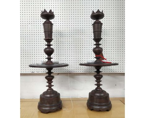 JULIAN CHICHESTER 'KATHRYN'S CANDLESTICK', a pair, 75cm H, aged mahogany. (2) 