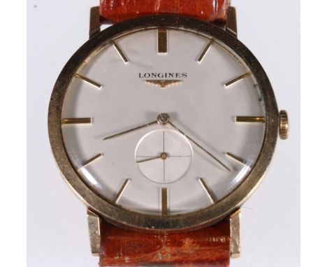 1960's Gents 9ct gold Longines wrist watch, the silvered baton numeral dial with seconds dial and tan leather strap, hallmark