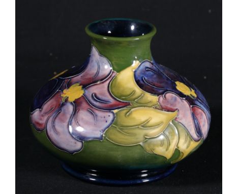 Moorcroft anemone pattern squat vase, 10cm.   CONDITION REPORT:  Colours are bright on one side, dull on other.  Crazed in ar