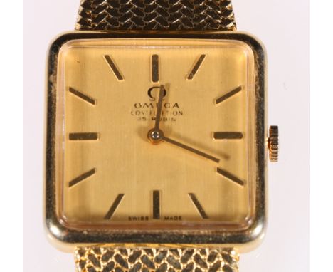 18ct gold Gents Omega Constellation wrist watch, with champagne baton numeral dial, 25 ruby movement on a woven bracelet, dat