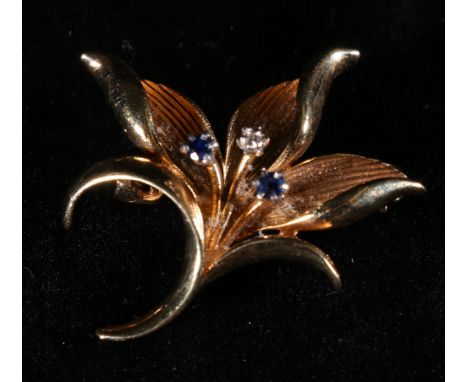 9ct gold sapphire and diamond floral spray brooch maker W & R, 4.6g   CONDITION REPORT:  Brooch appears well.  In need of lig