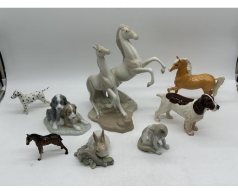 collection of Animal Figurines to include Lladro, NAO, Beswick England, and others. 
Hairline crack damage to the Beswick Dal