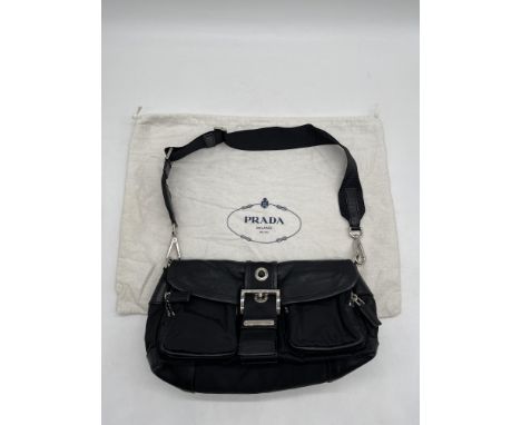Prada Tessuto Crossbody Nylon Body with Leather Trim Bag. 
No further descriptions, photographs, or condition reports are ava