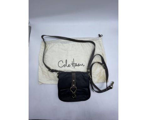 Cole Haan Leather Crossbody Bag with Metal Hook Closure. 
No further descriptions, photographs, or condition reports are avai