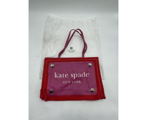 Kate Spade New York Red and Pink Canvas Tote Handbag. 
No further descriptions, photographs, or condition reports are availab