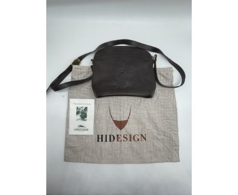 Longchamp Black Leather Crossbody Shoulder Bag. 
No further descriptions, photographs, or condition reports are available for