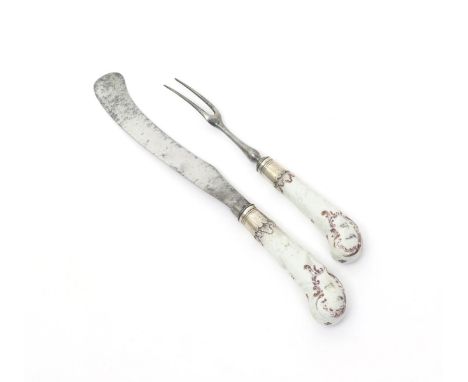 A knife and fork with Longton Hall porcelain handles, c.1755, the pistol hafts moulded with scrollwork and painted with the a