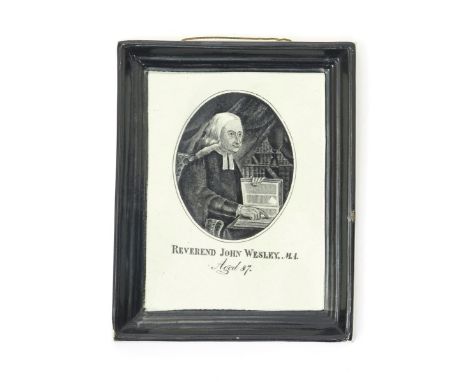 A good pearlware plaque of John Wesley, c.1800, the rectangular form printed with an oval portrait of the cleric reading a re