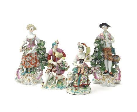Two pairs of Derby figures, c.1760-65, one pair of seated musicians, he playing the bagpipes and she the mandolin, the other 