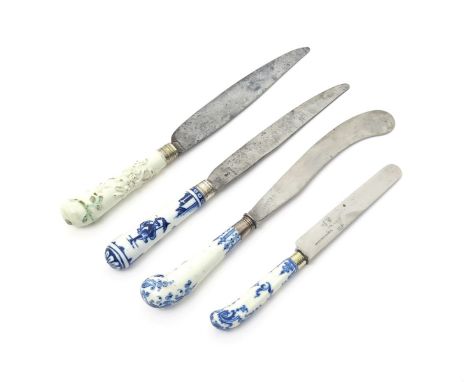 Four St Cloud knife handles, c.1720-50, one with a cannon haft painted in blue with a Chinese figure holding a parasol, the r