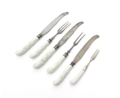 Three Chelsea white-glazed knife handles and three forks, c.1752, the knives and one three-pronged fork with pistol hafts mou