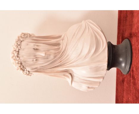 A resin bust of a female portrait. H=33, W=22, D=18cm