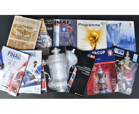 Football programmes from the FA Cup Finals to comprise of; the 1998 final between Arsenal and Newcastle United, signed to the